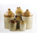 A collection of stoneware flagons and jars, late 19th/early 20th century, including examples