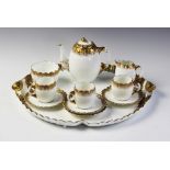 An Aynsley tea service with tray, late 19th/early 20th century, comprising a teapot and cover, three