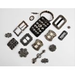 A selection of late Georgian and Victorian cut steel jewellery, to include a tapered cuff of pierced