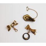A selection of Victorian and later brooches, to include a yellow metal and tortoiseshell bow brooch,