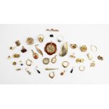 A selection of 9ct gold and yellow metal accessories, to include a 9ct gold carved cameo pendant,