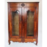 An 18th century and later French cherry wood display cabinet,