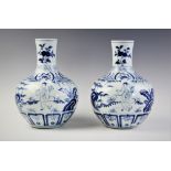 A pair of Chinese blue and white bottle vases, 20th century, each with six character mark within