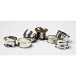 A selection if eight Edwardian and later silver napkin rings, to include and example by Williams