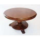 A William IV mahogany centre table, the circular thumb moulded top raised upon a hexagonal