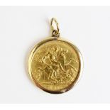 A George V gold half sovereign, dated 1911, within a 9ct gold pendant mount, weight 4.9gms