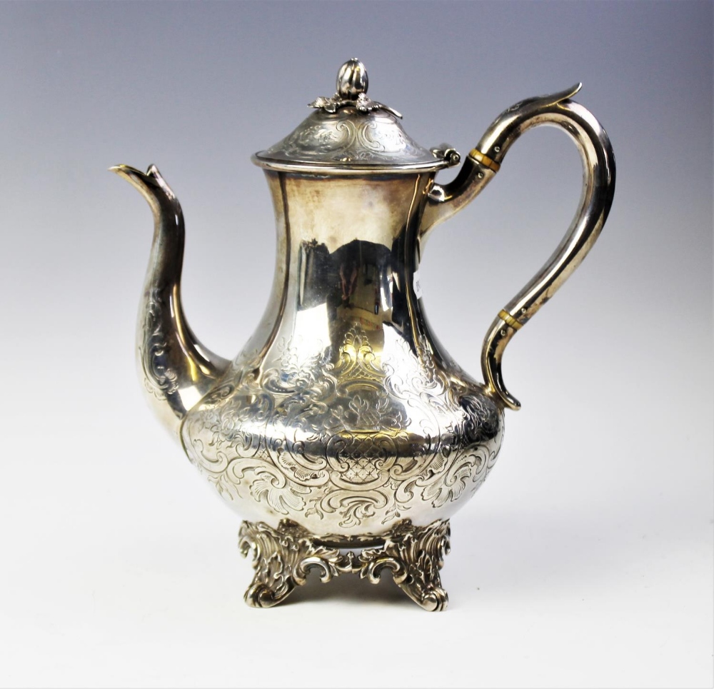 A Victorian silver coffee pot by John Wellby, London 1843, of baluster form on four scrolling - Image 3 of 4