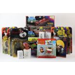 A collection of collectable movie figures, comprising four McFarlane Toys Austin Powers figures, a
