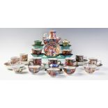 A Chinese porcelain Mandarin palette part tea service, 18th century, comprising; five tea bowls, 4.