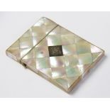 A Victorian mother of pearl visiting card case, late 19th century, the case of typical hinged
