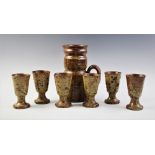 A French studio pottery cider set, 20th century, comprising six goblets and a tall jug with
