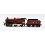 An O Gauge clockwork 4-4-0 locomotive and tender, probably by Bassett-Lowke, in maroon L.M.S.