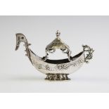 An miniature silver model of a boat, import marks for George Bedingham, Chester 1906, 10.7cm long,
