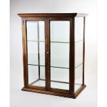 A McVitie & Price advertising display cabinet, early 20th century, the walnut cabinet with glazed