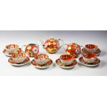 A six setting Russian porcelain tea service by Dulevo, mid 20th century, comprising: six cups, six