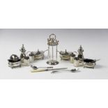 An Edwardian silver cruet set by Levesley Brothers, Sheffield 1906, comprising two salts, two wet