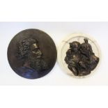 A patinated bronze circular portrait plaque, cast in relief with a profile of a Victorian