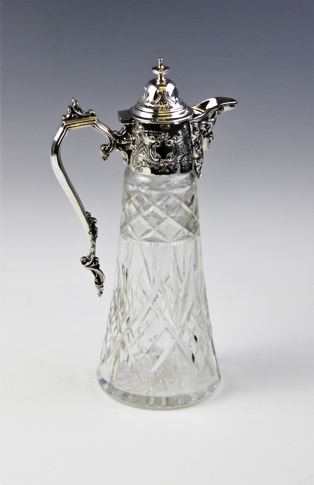 An Edwardian silver mounted cut glass claret jug, Sheffield 1905, of tapering form with star cut - Image 2 of 3