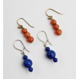 A pair of coral beaded drop earrings, each drop comprising three gradated polished coral beads, 17mm