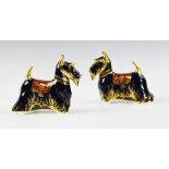 A Royal Crown Derby paperweight, modelled as a Scottish Terrier with gold stopper, 11cm high, with a