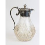 A silver mounted cut glass claret jug by F G Flavell Ltd, Birmingham 1979, of baluster form with