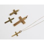 An Edwardian 9ct gold cross pendant, Chester 1902, of plain polished form, 3.3cm x 2.1cm, together