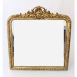 A French Louis XVI style gilt wood over mantle mirror, late 20th century, with an open work shell