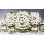 An extensive Paragon part dinner service, each piece decorated in the Rockingham pattern against a