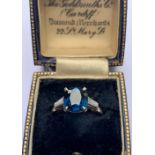A Burmese sapphire and diamond ring, the central rectangular cushion cut sapphire (measuring