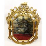A 19th century gilt wood and gesso wall mirror, surmounted with two gilt wood doves