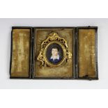 A Victorian watercolour on ivory bust length portrait miniature of a young boy, late 19th century,
