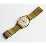 A gent's vintage 9ct gold Avia 17 jewels Incabloc wristwatch, the round cream dial with with baton