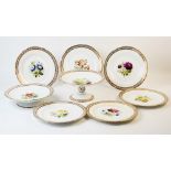 A Staffordshire botanical dessert service, 19th century, comprising a tall comport, a low comport,