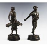 Two cast spelter figures, 20th century, one modelled as a man sowing seed, the other as a woman