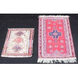 A hand knotted prayer rug, adorned with stylised zoomorphic motifs on a taupe ground,
