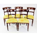 A harlequin set of seven mid 19th century mahogany dining chairs, to include five chairs each with a