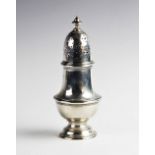 A George V silver sugar caster by Harrods Ltd, London 1936, of typical form with reeded borders on