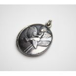 A Berthold Loffler for Wiener Werkstatte silver coloured locket pendant, of oval form decorated with