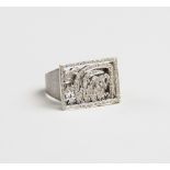 An 18ct diamond set signet ring, the central pierced rectangular panel with Arabic characters set