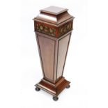 An Edwardian mahogany lamp or urn pedestal, the pagoda shaped top above a fretwork frieze, and a