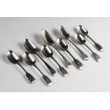 Six Victorian fiddle pattern dessert spoons, five by Henry Holland, London 1864, and one example