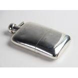 A silver hip flask by Henry Matthews, Birmingham 1924, of rectangular plain polished form with