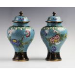 A pair of Chinese cloisonné vases and covers, 20th century, each of baluster form and externally