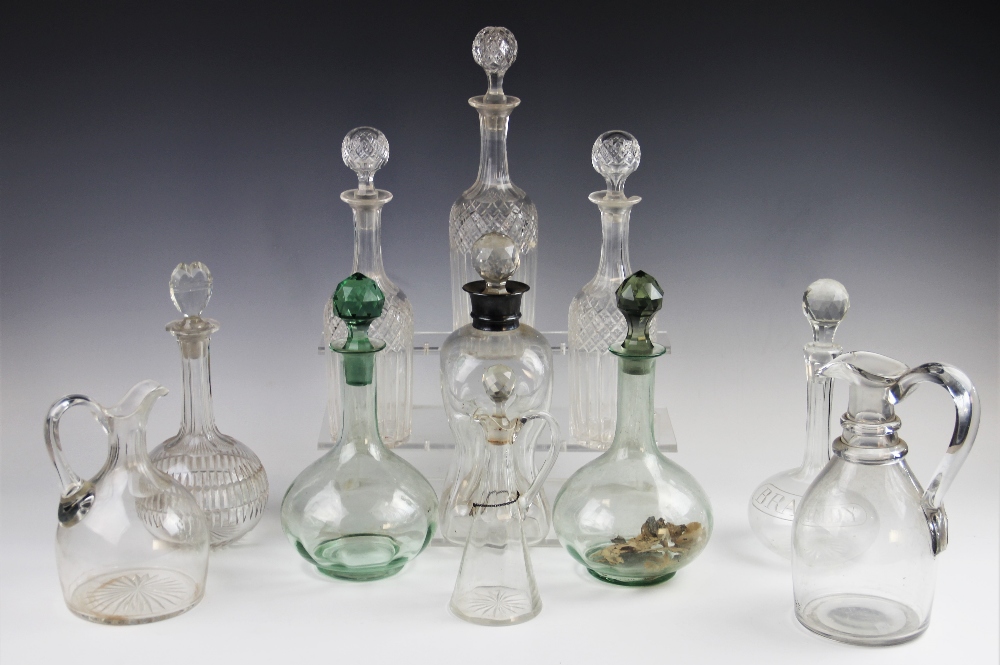 A selection of 19th century and later decanters and stoppers to include, a silver mounted glug - Image 2 of 2