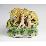 A Staffordshire pearlware figural group in the manner of Walton, modelled as Romulus and Remus