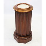 A Victorian mahogany marble top pedestal cupboard, the circular moulded top inset with a white