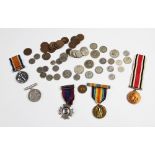 A collection of medals and coins to include a WWI pair awarded to 'A. B. Robert Gwen No.173667'