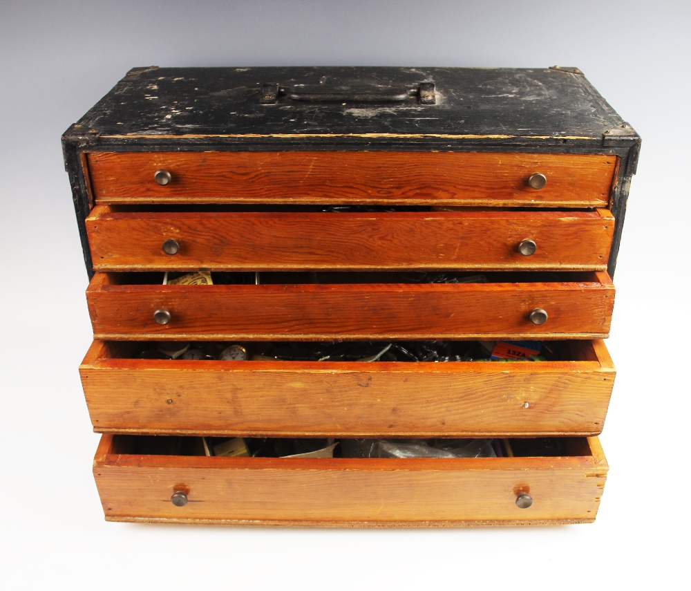 A collection of watch parts and effects, to a painted wooden five drawer specimen chest, to