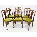 A set of twelve Queen Anne style walnut dining chairs, mid 20th century, each with a vase shaped