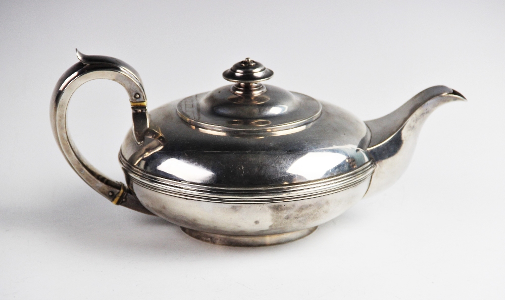 A George IV silver teapot by Rebecca Emes & Edward Barnard I, London 1828, of squat circular form